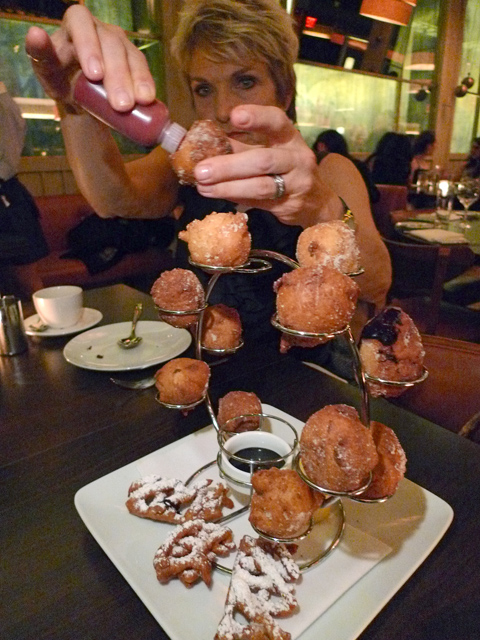 Shooting sauce into the interactive donuts evokes delusions of Ferran Adria. Photo: Steven Richter