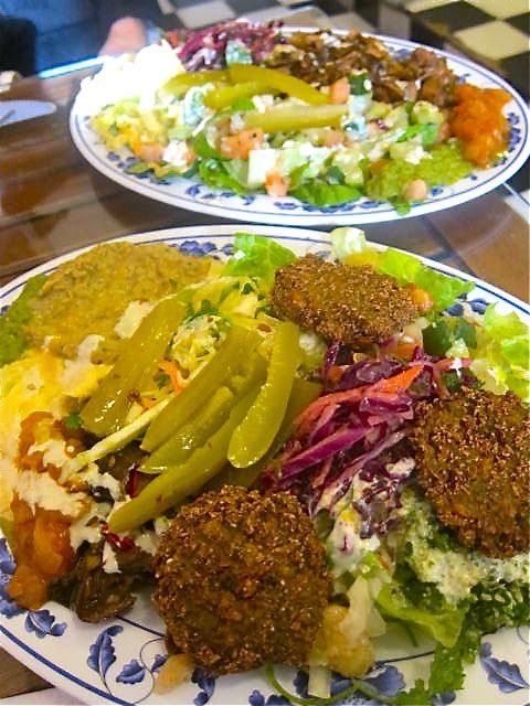 Get the falafel plate with marinated eggplant, hummus, tabbouleh and a cauliflower side. 
