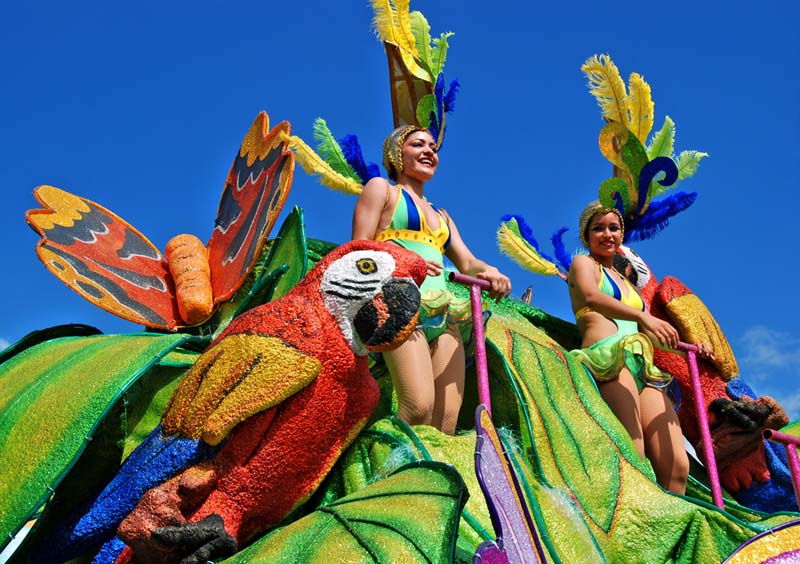 Beauty queens in feathers and spandex ride the floats at Carnaval. Photo: Steven Richter