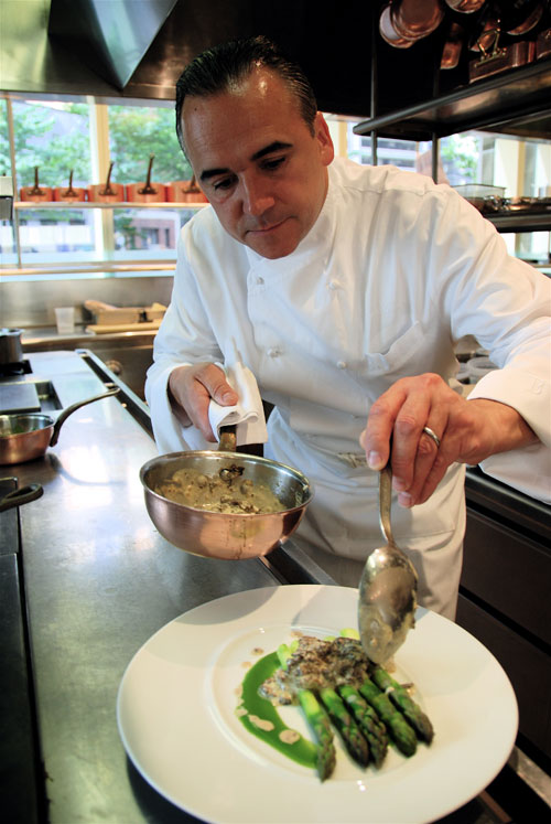 Jean Georges usually leaves cooking to the chef de cuisine but he hasn't forgotten how.   Photo: Steven Richter