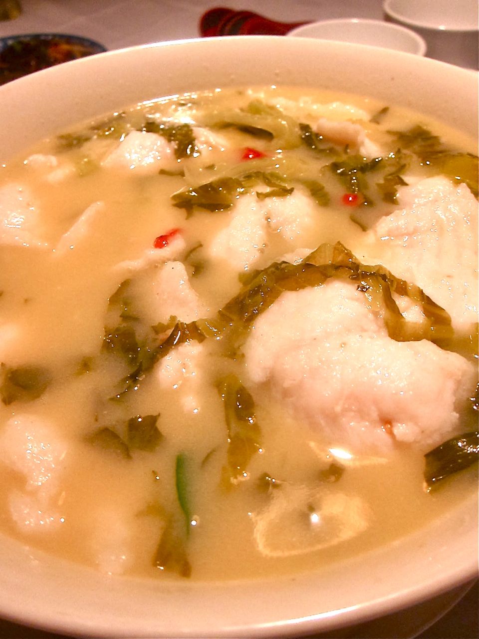 A blind stab at the baffling menu brings splendid “authentic Chengdu soup” with tofu and pickled mustard greens.” Photo: Gael Greene