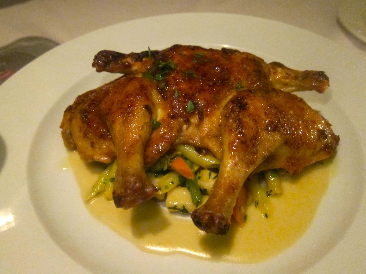 A small chicken “mattone” is juicy, perfectly cooked, Pino’s own recipe. 