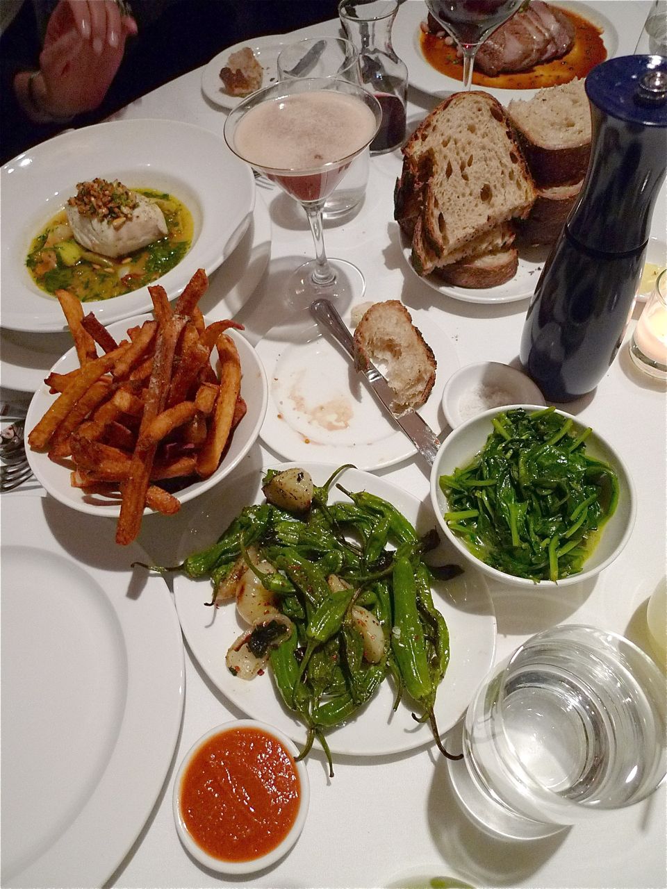 From right: griddled spinach, grilled Shishitos,thrice-fried fries, halibut. Photo: Steven Richter 