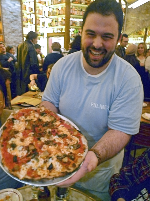 Slipping between tables to serve our crisp, bubbly, lightly singed pizza. Photo: Steven Richter