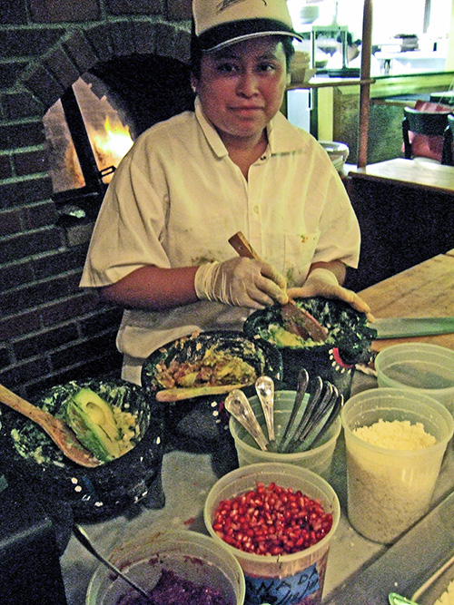 Watch the guacamole-makers in the madness of pre-theater Toloache. Photo: Steven Richter