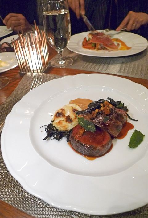 Roasted venison is a standout with black trumpet mushrooms and quince. Photo: Steven Richter